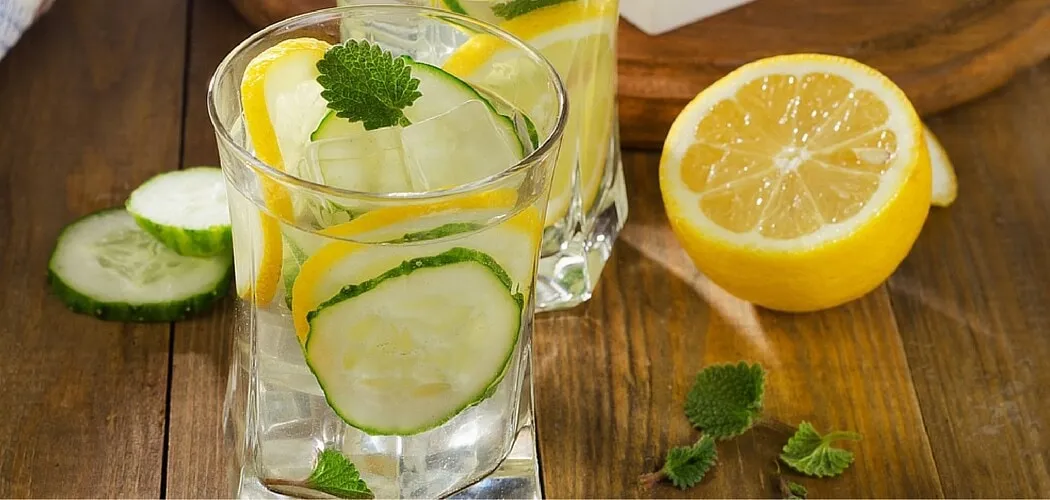 Glasses of cucumber lemon water with mint
